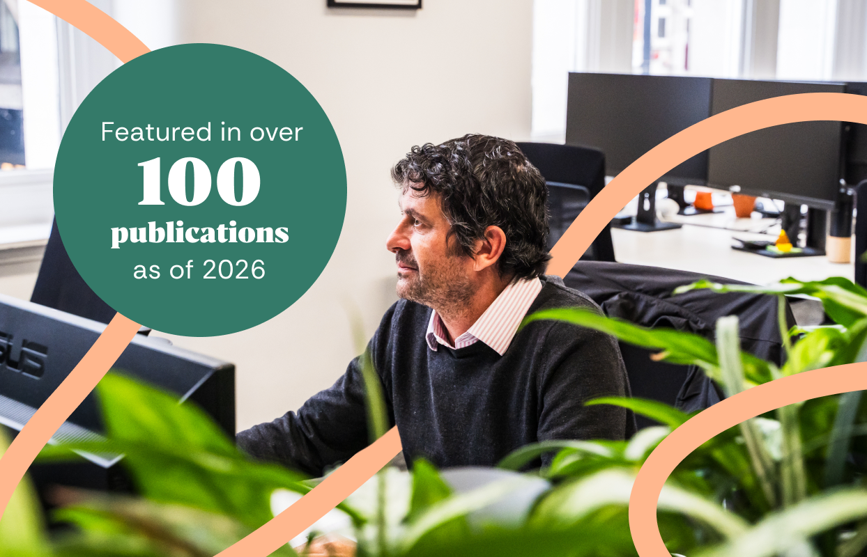 Konnect You team member working at a desk, with over 100 publications featured as of 2026.