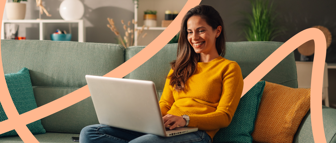 Woman using a laptop at home to find trusted professionals with Konnect You.